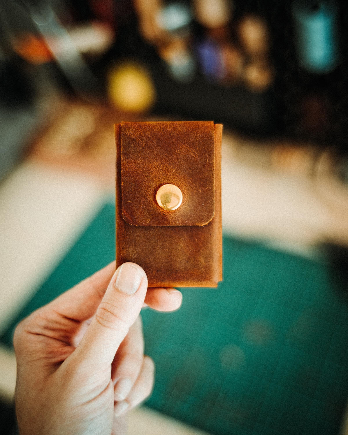 Crazy Horse full-grain leather wallet showing natural patina and color depth