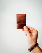 Crafted from high-quality glossy leather for a sleek, eye-catching look