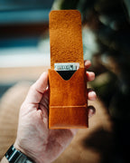 Crafted from high-quality glossy leather for a sleek, eye-catching look