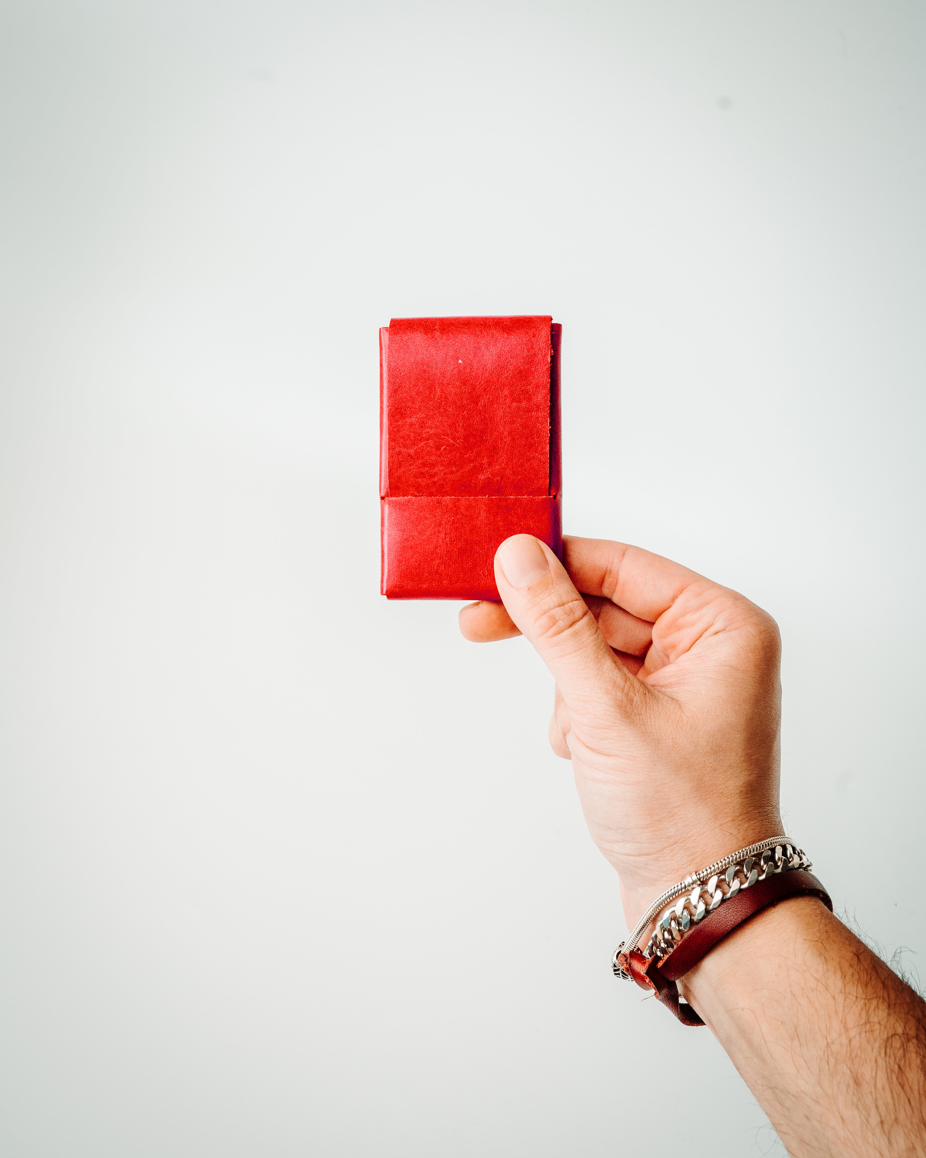 Crafted from high-quality glossy leather for a sleek, eye-catching look