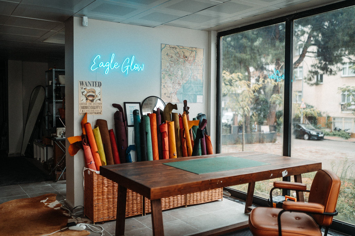 Cutting table and leather wall in the studio