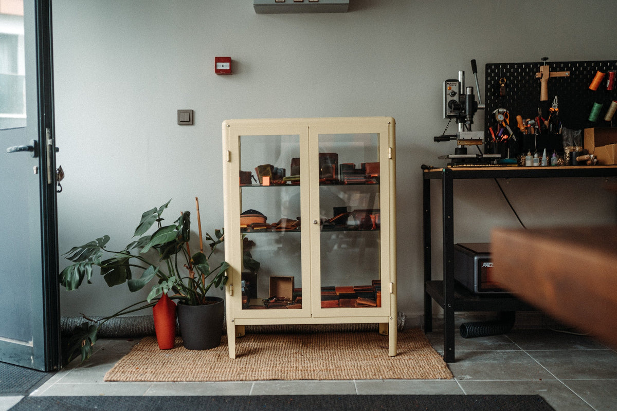 Display cabinet by the studio door