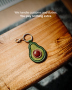 The Avocado Charm - We handle customs and duties. You pay nothing extra.