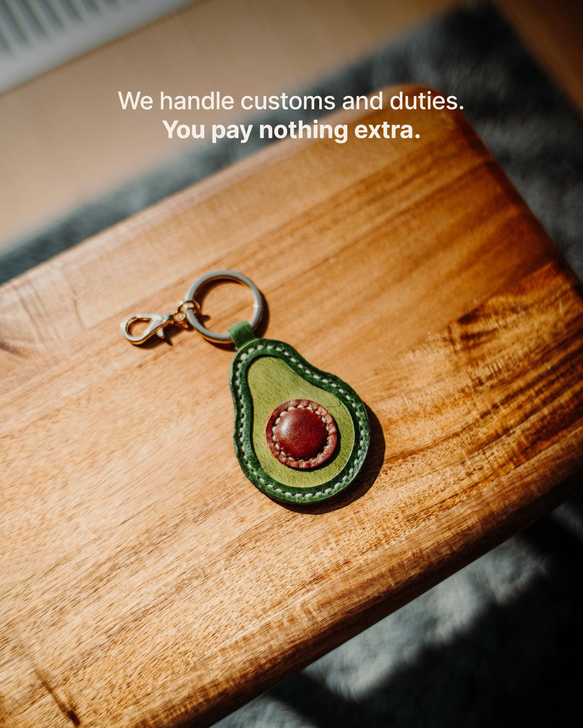 The Avocado Charm - We handle customs and duties. You pay nothing extra.