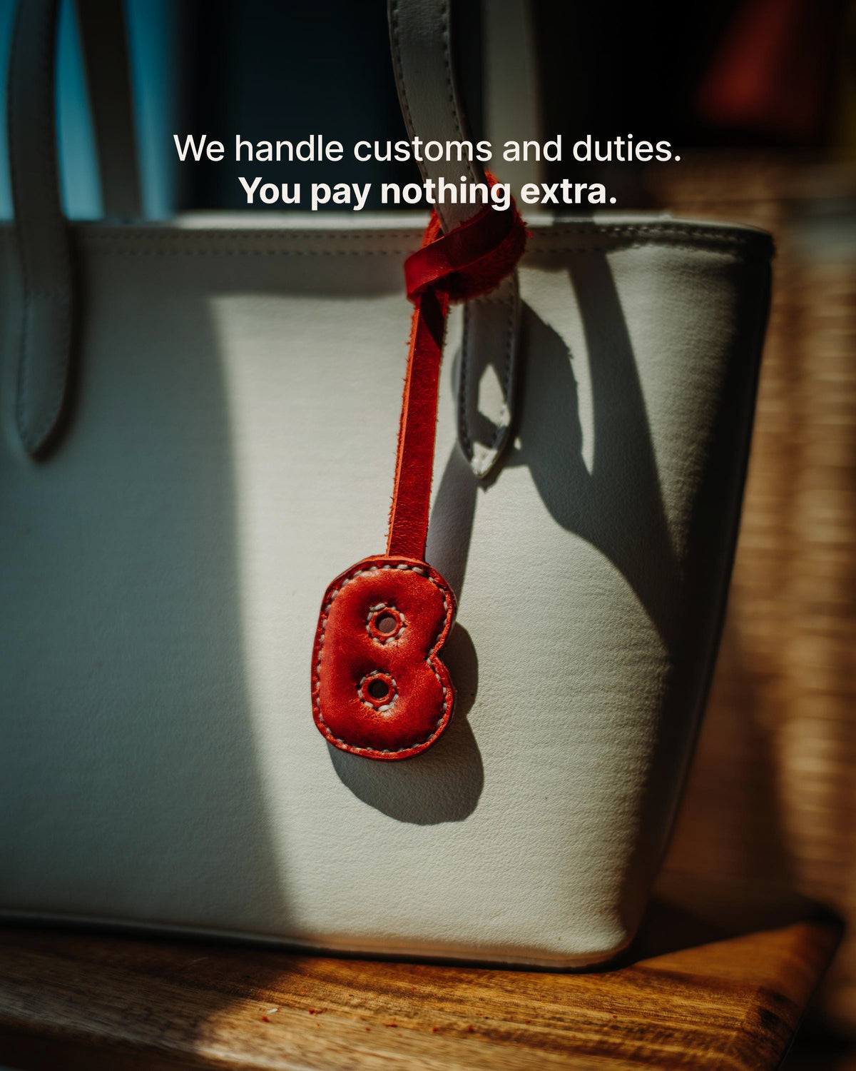 The Monogram Charm - We handle customs and duties. You pay nothing extra.