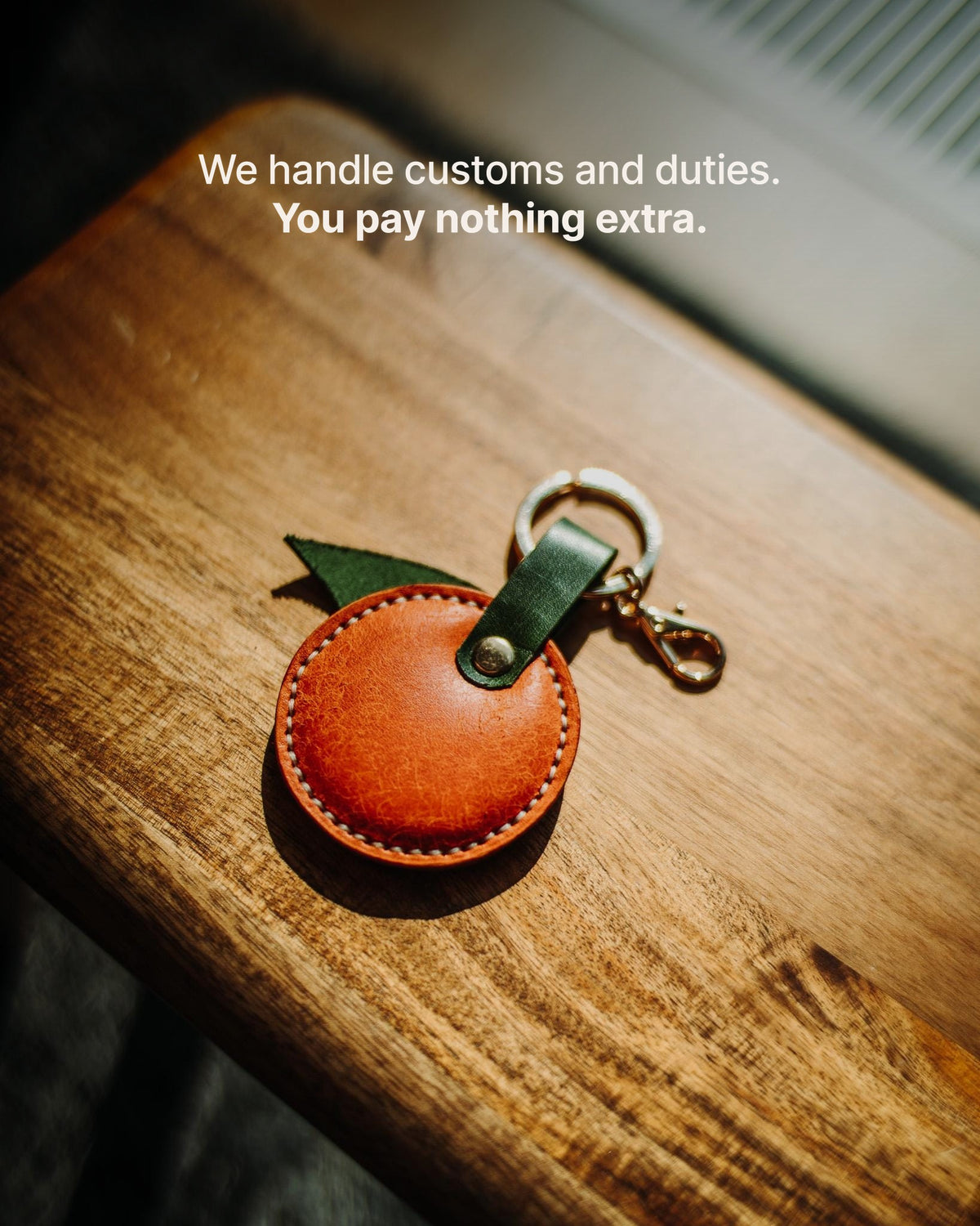 The Orange Charm - We handle customs and duties. You pay nothing extra.